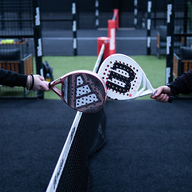 Rackets touching at the net
